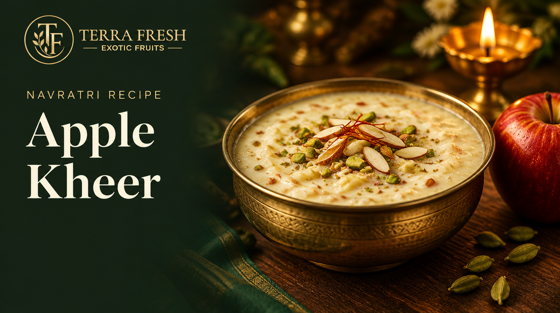 Apple kheer topped with almonds and pistachios beside a red apple