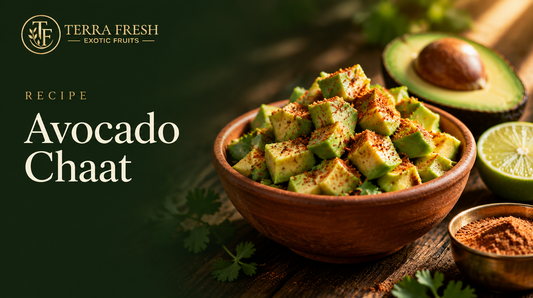 Avocado chaat in a terracotta bowl with lime and chaat masala